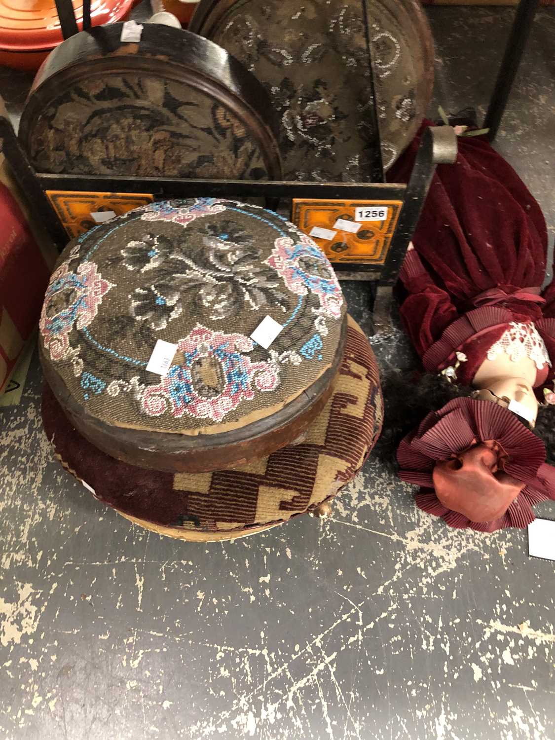Lot 1256 - Three bead work footstools, another, a doll...