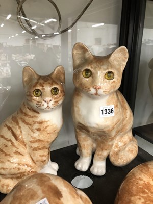 Lot 1336 - Four Winstanley pottery ginger cats