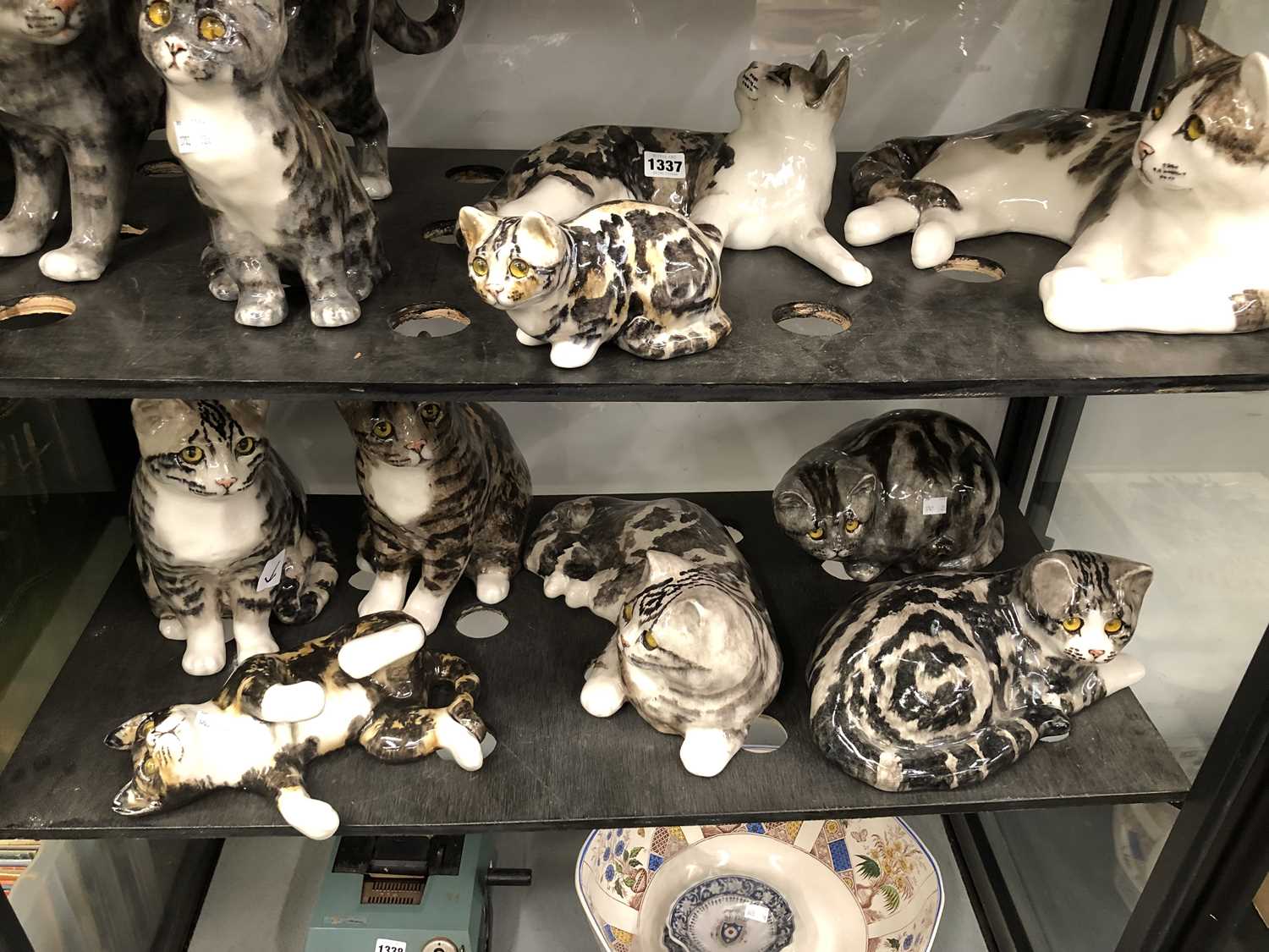 Lot 1337 - Eleven Winstanley pottery cats and kittens