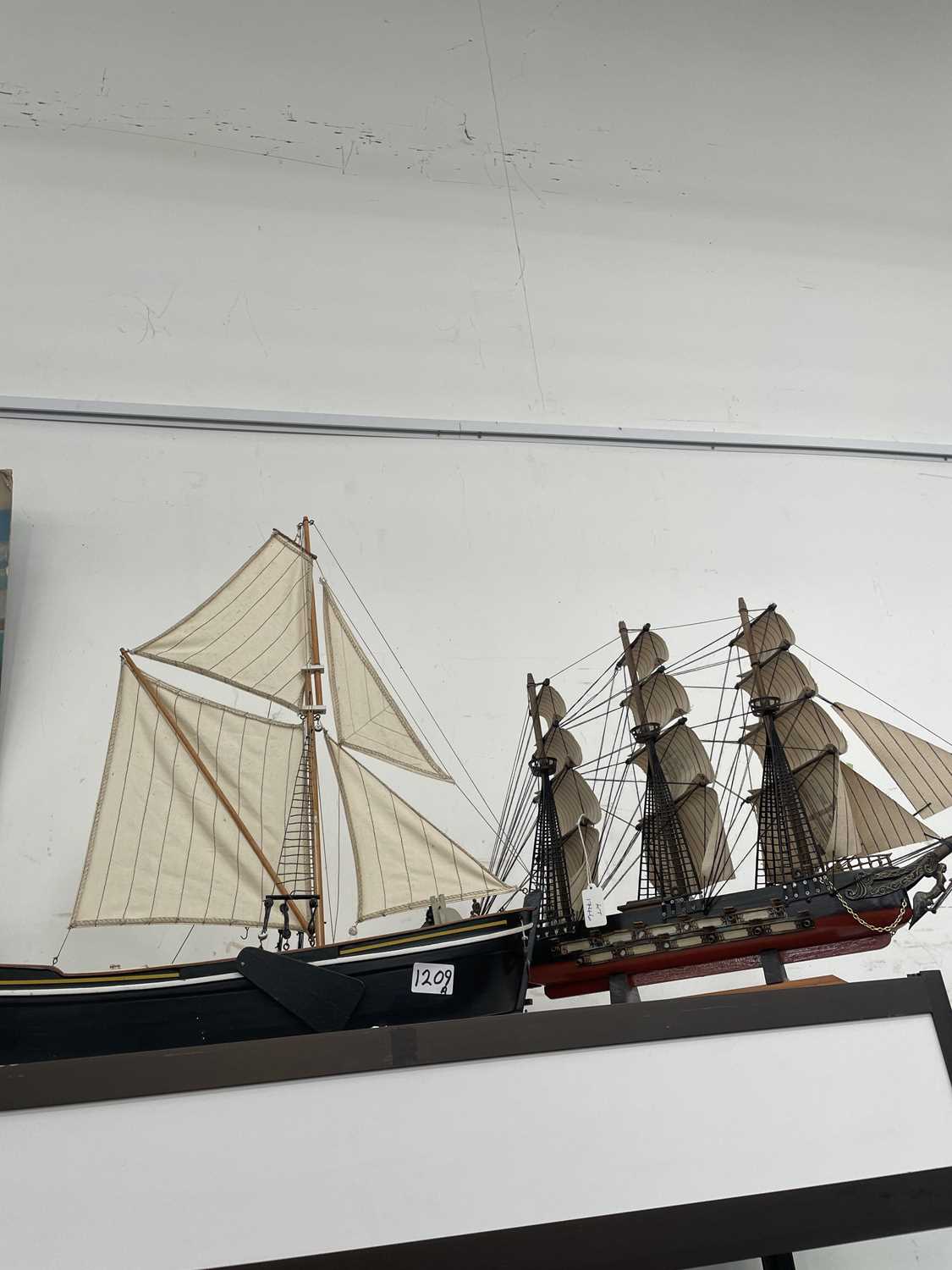 Lot 1209 - Two model sailing boats. Yacht H 62cms L 69cms....