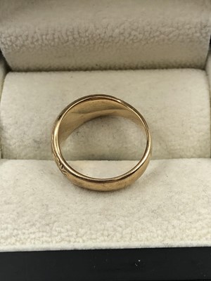 Lot 267 - A vintage bump band ring. Unhallmarked,...