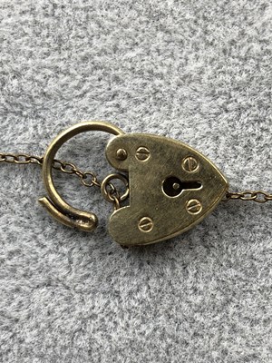 Lot 268 - A 9ct hallmarked gold fancy link gate bracelet...