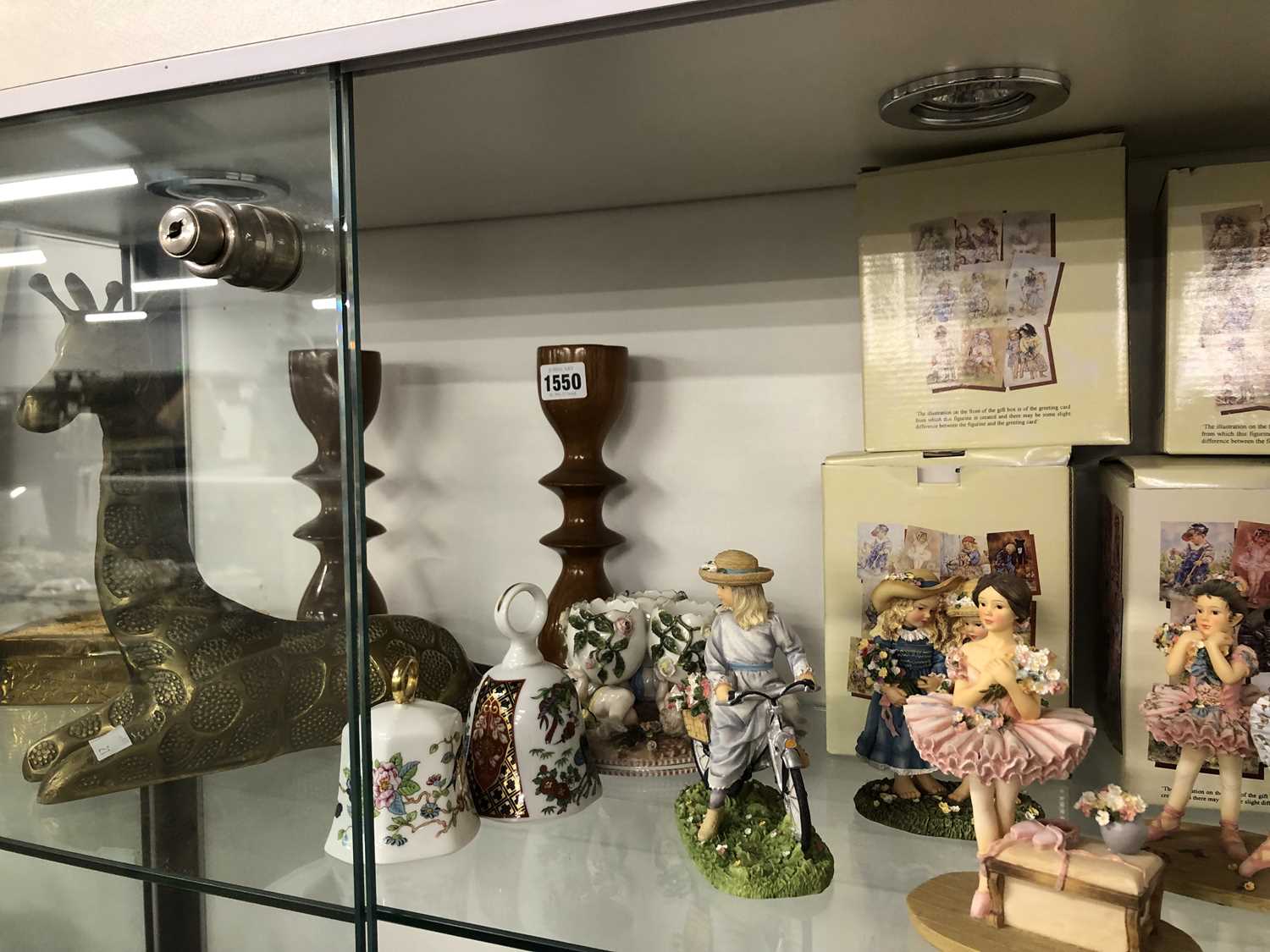 Lot 1550 - A bronze reclining giraffe, four Leonardo...