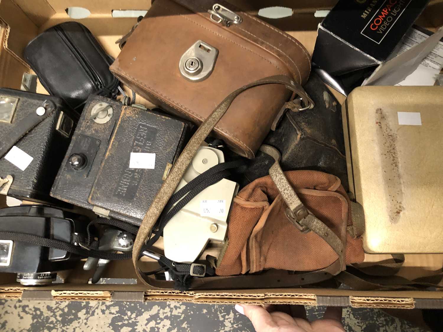 Lot 1564 - A cased Hilger Watts theodolite together with...