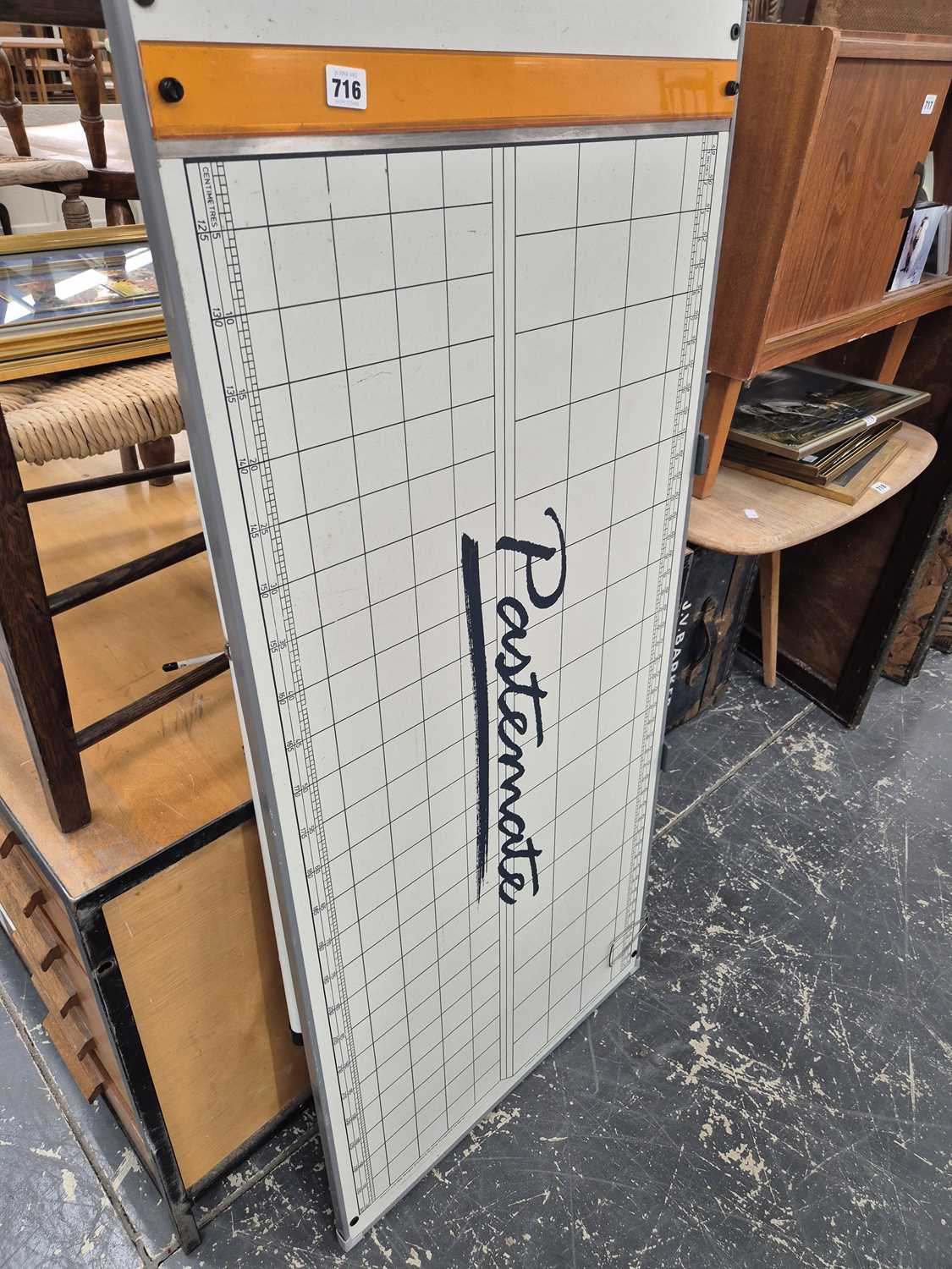 Lot 716 - A paste-mate folding work table.