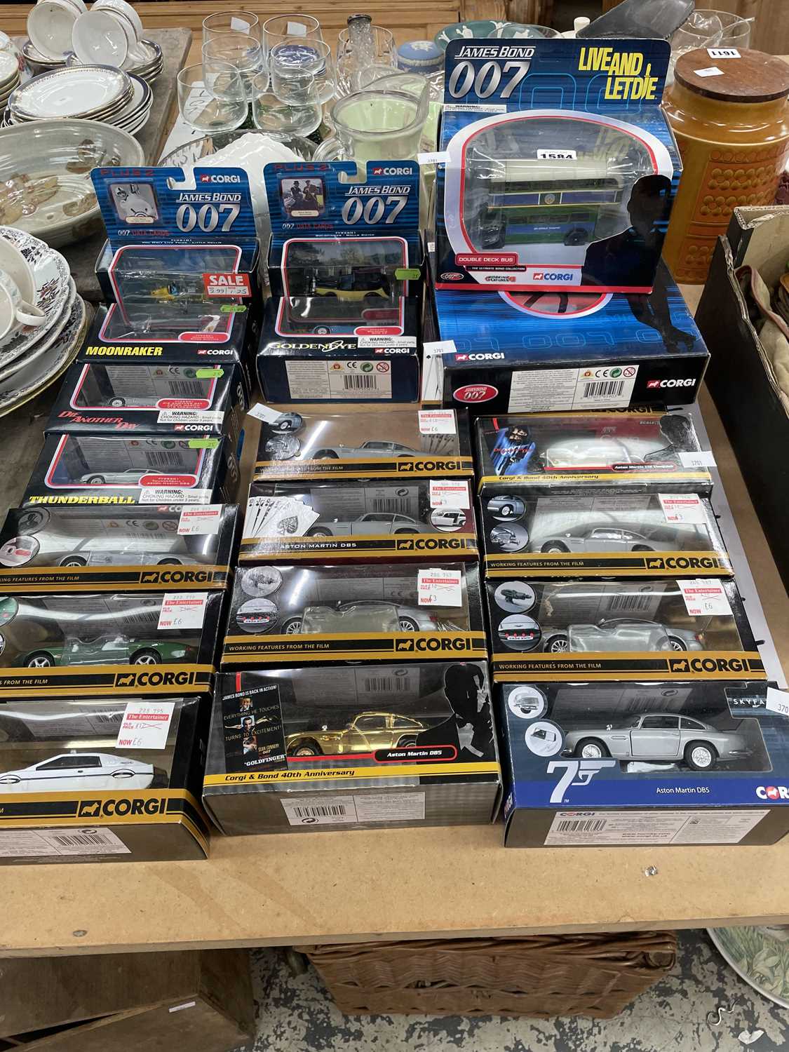 Lot 1584 - A collection of boxed Corgi Aston Martins and...