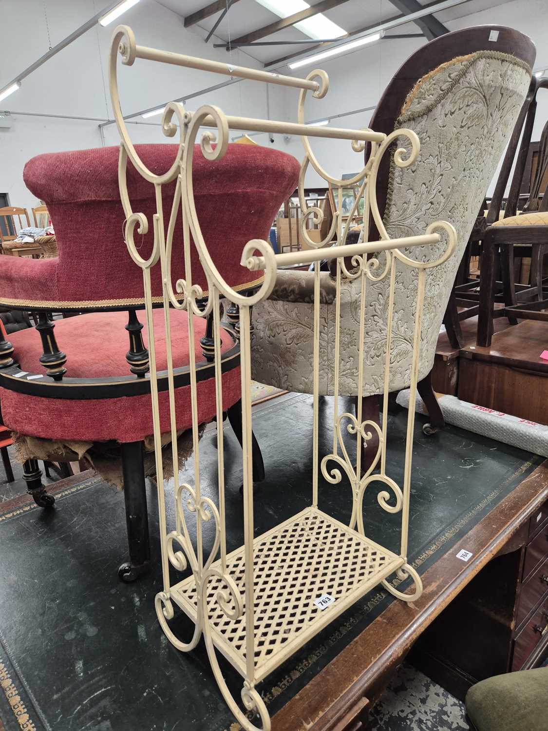 Lot 763 - A wrought iron towel stand.