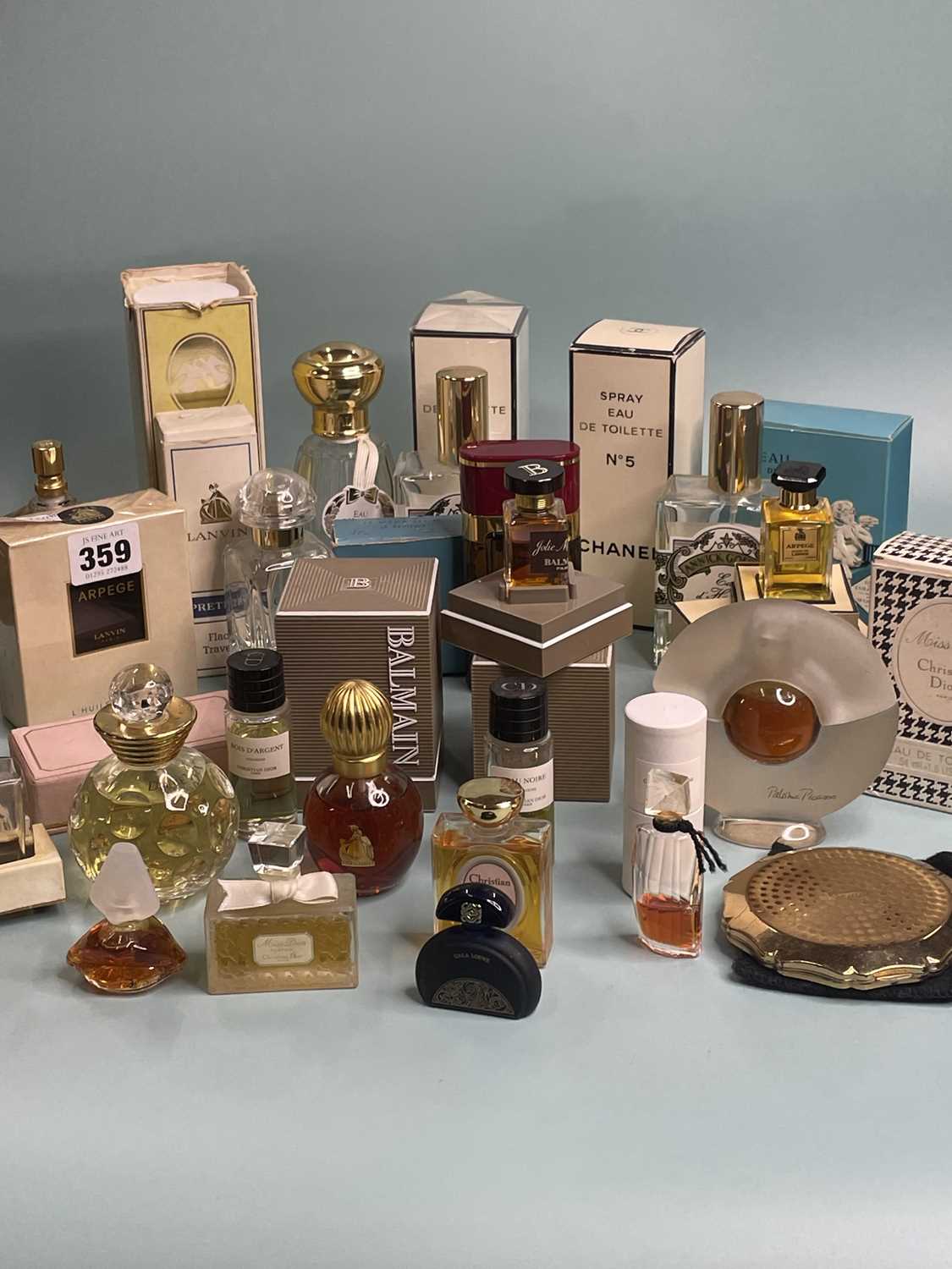 Lot 359 - A collection of  vintage perfume bottles,...