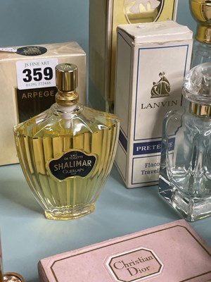 Lot 359 - A collection of  vintage perfume bottles,...