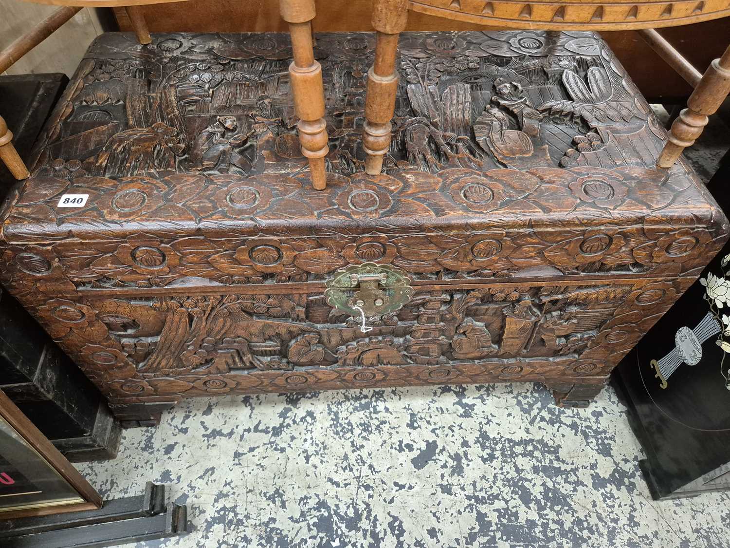 Lot 840 - An orienatal carved camphor wood blanket box.
