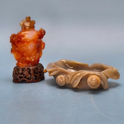 Lot 358 - A Chinese grey agate bowl carved with leaves...