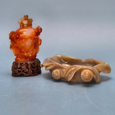 Lot 358 - A Chinese grey agate bowl carved with leaves...