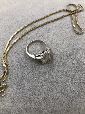 Lot 406 - A 14ct white gold cz set dress ring and a 375...
