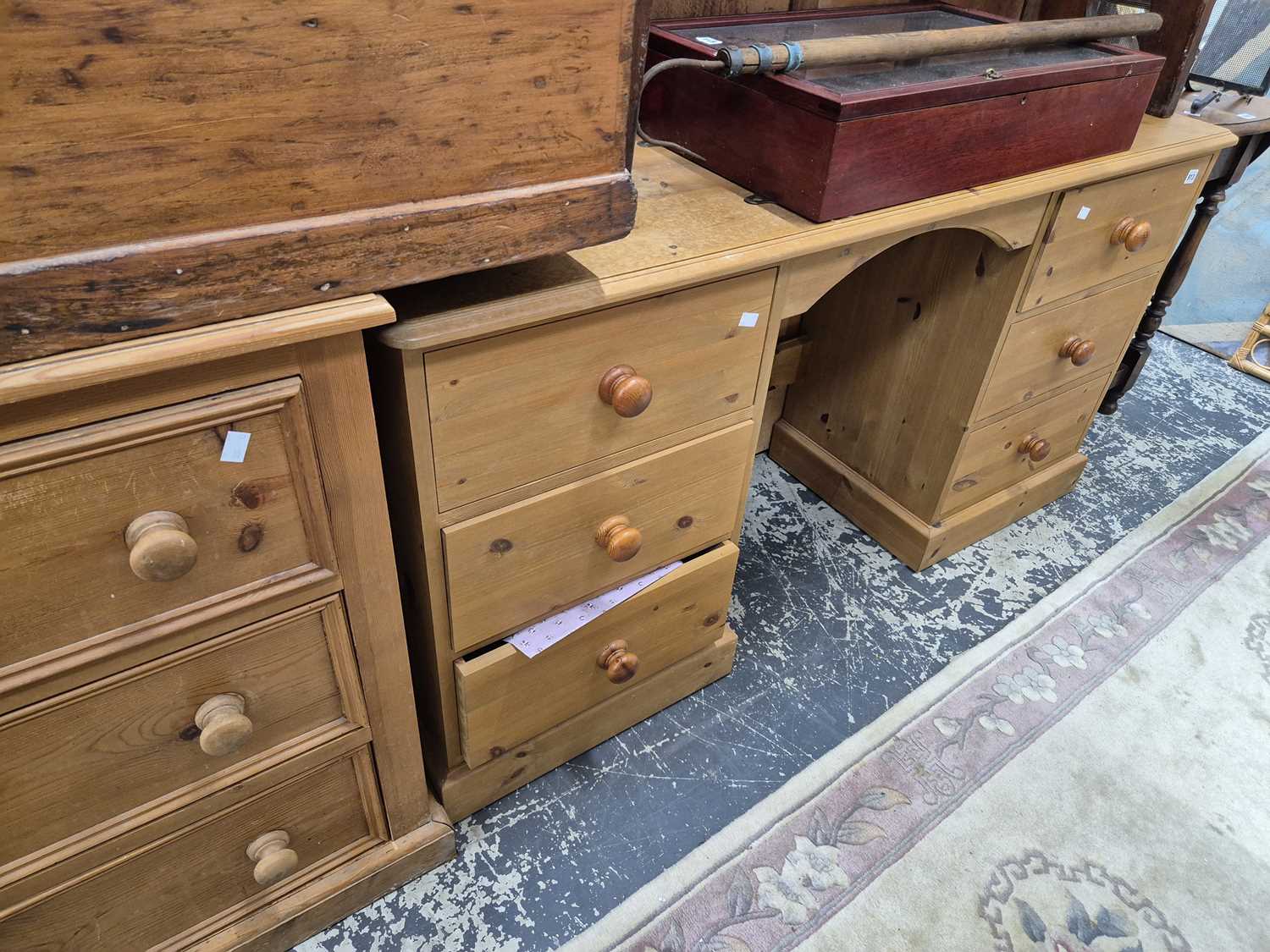 Lot 913 - A pine three drawer chest and a pine dressing...
