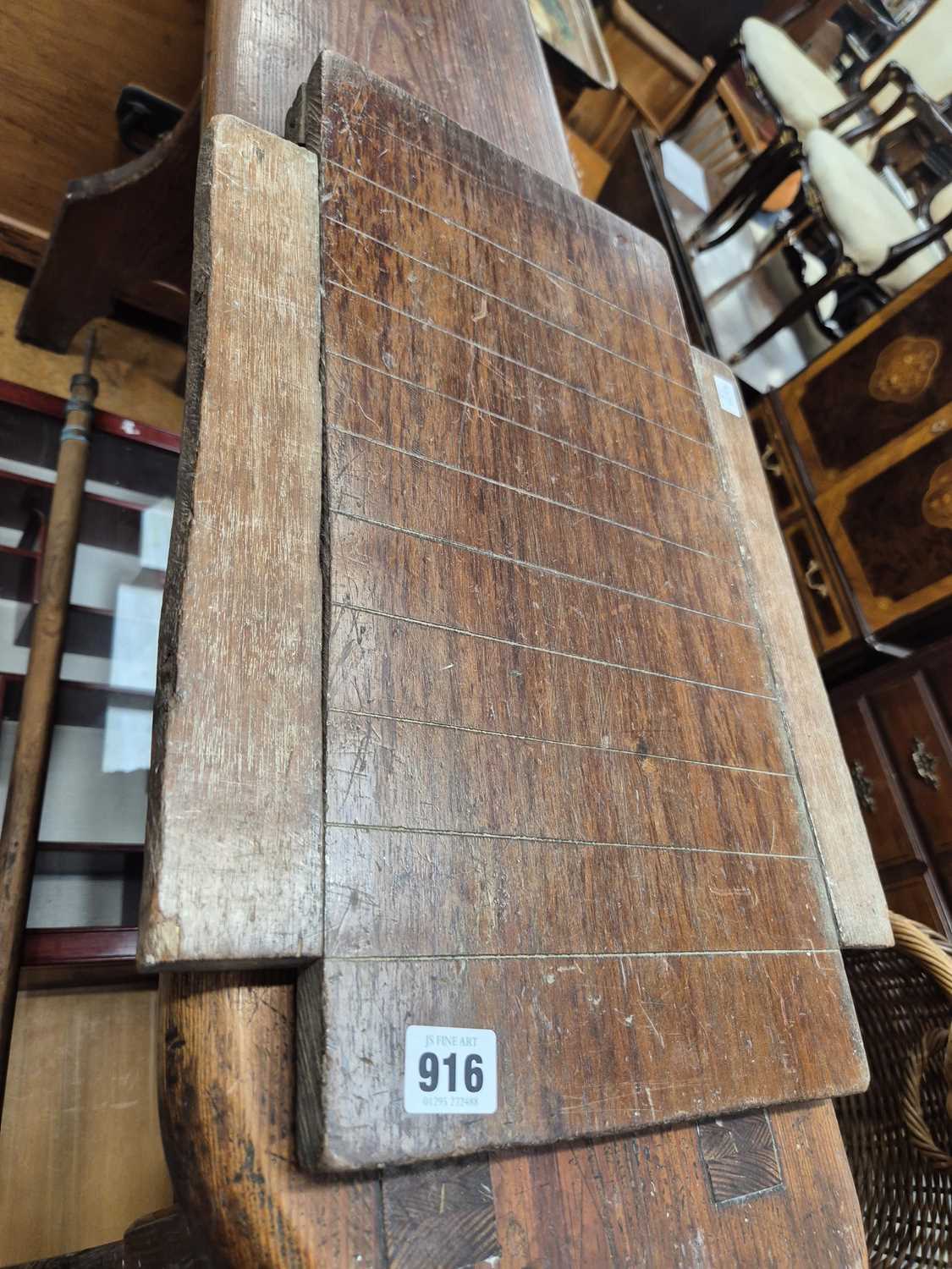 Lot 916 - A shove ha'penny board.