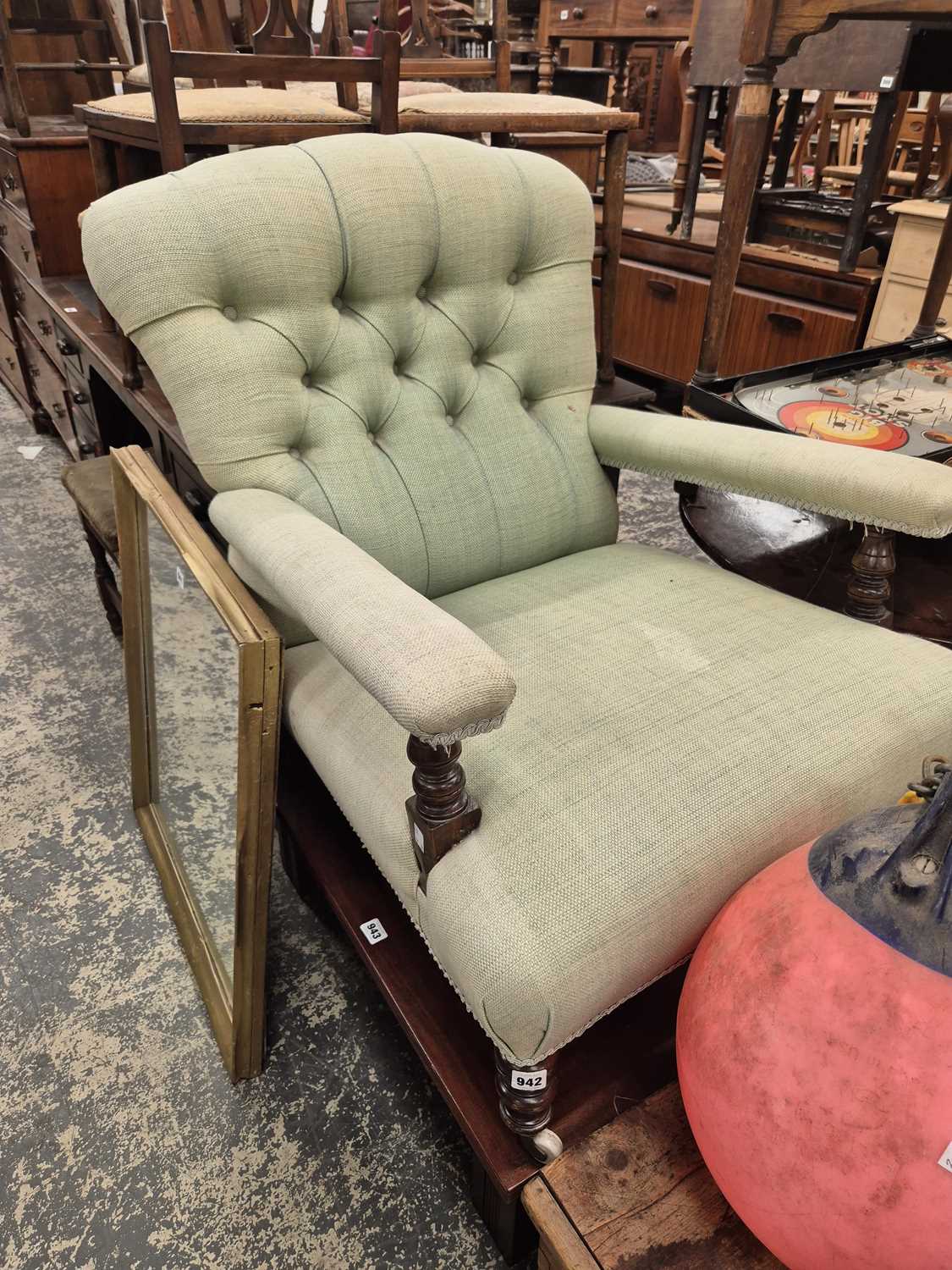 Lot 942 - A Victorian button back armchair.
