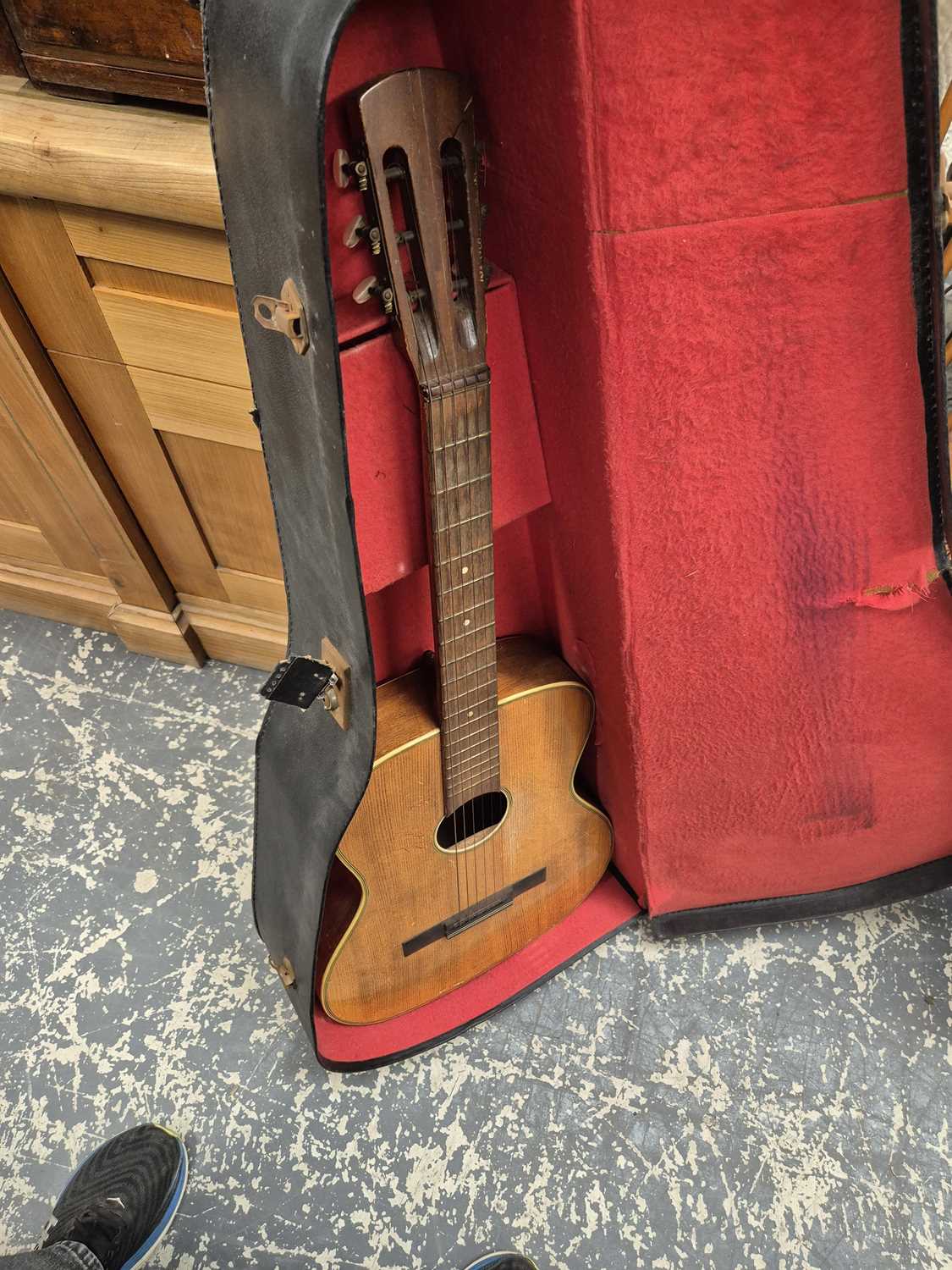 Lot 960 - A vintage acoustic guitar and case.