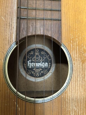 Lot 960 - A vintage acoustic guitar and case.