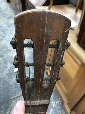 Lot 960 - A vintage acoustic guitar and case.