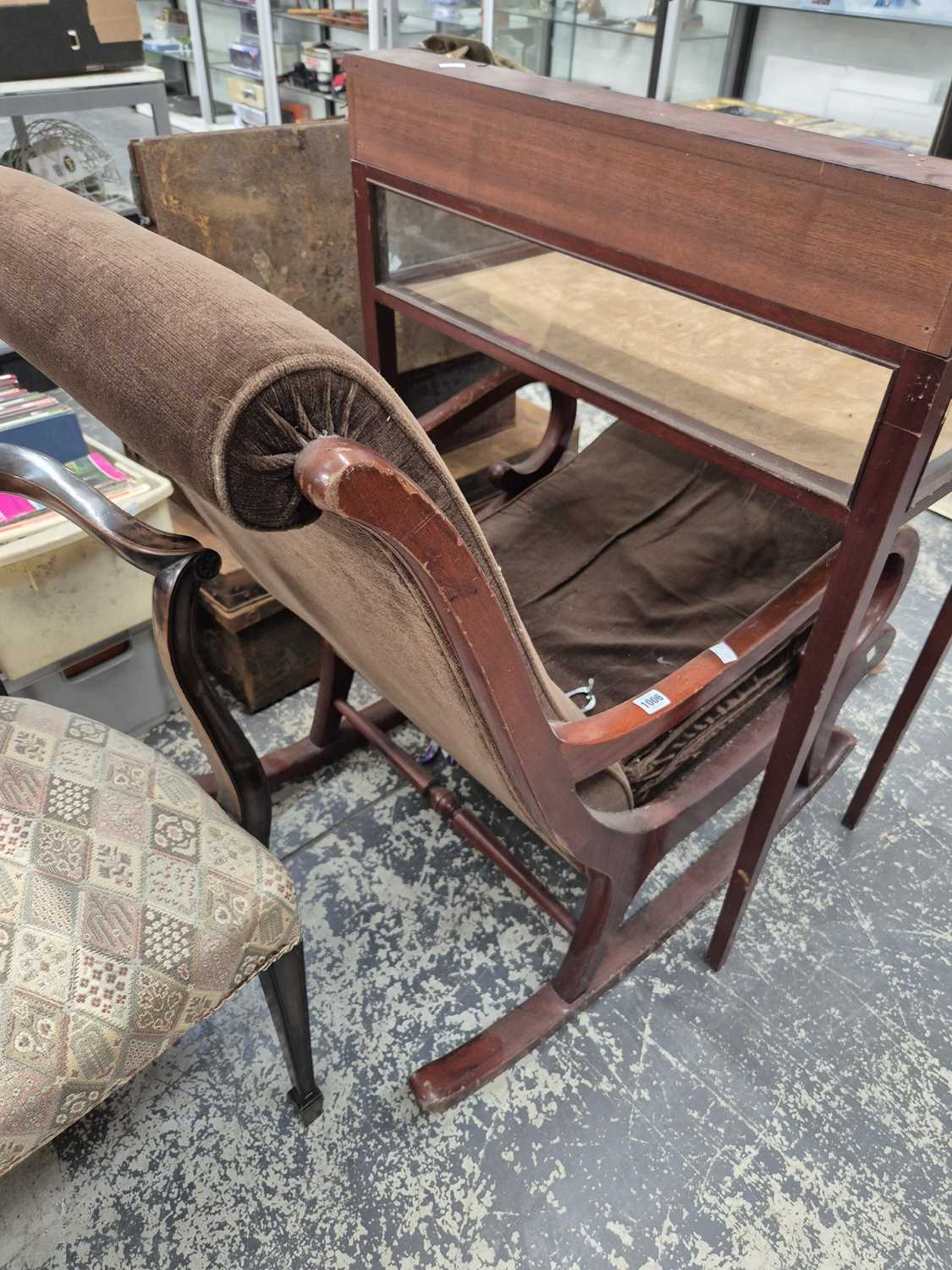 Lot 1006 - A mahogany framed rocking chair.