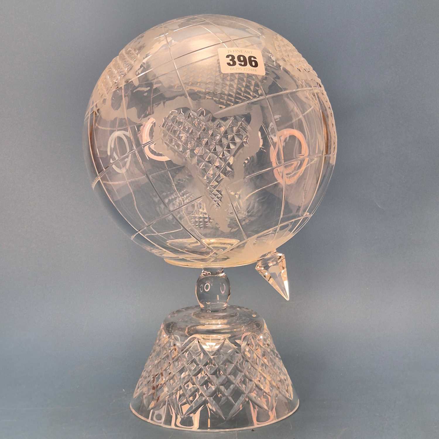 Lot 396 - A cut and frosted glass terrestrial globe.   H...