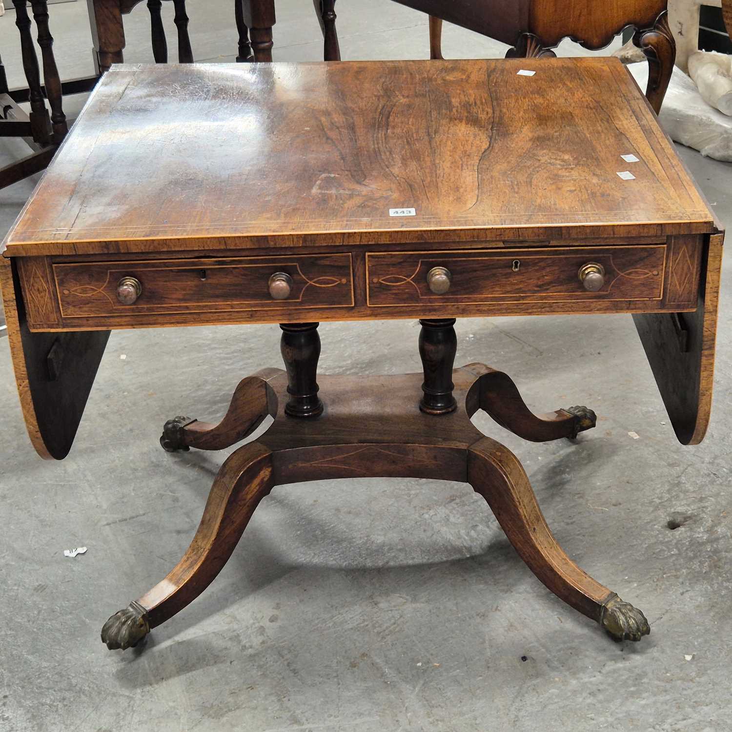 Lot 443 - A 19th century rosewood sofa table with a real...