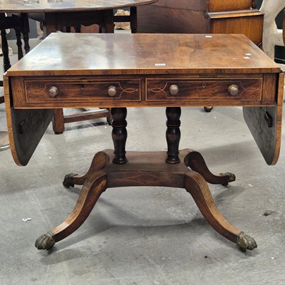 Lot 443 - A 19th century rosewood sofa table with a real...