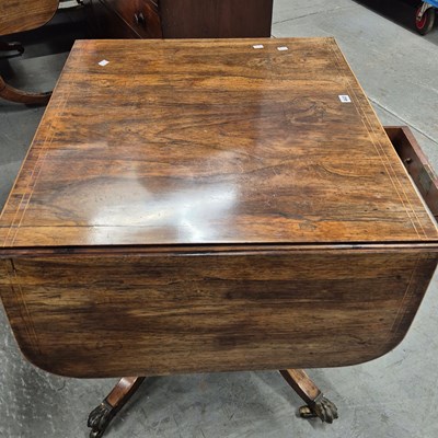 Lot 443 - A 19th century rosewood sofa table with a real...