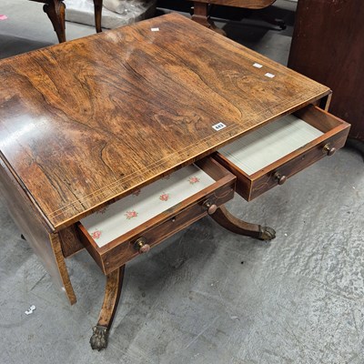 Lot 443 - A 19th century rosewood sofa table with a real...