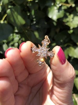 Lot 6 - An antique diamond cluster cross pendant, set...