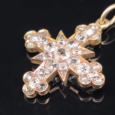 Lot 6 - An antique diamond cluster cross pendant, set...