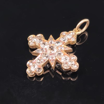 Lot 6 - An antique diamond cluster cross pendant, set...