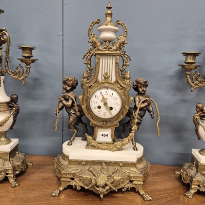Lot 454 - An ormolu, bronze and white marble clock...