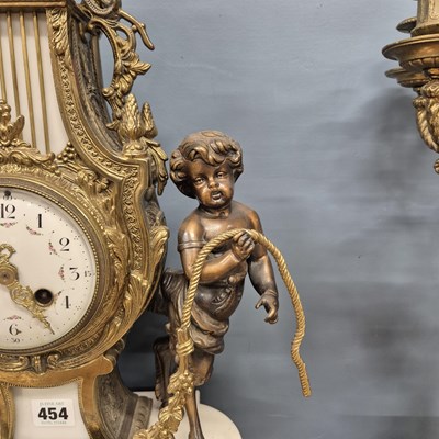 Lot 454 - An ormolu, bronze and white marble clock...