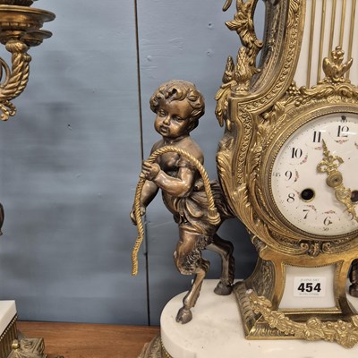 Lot 454 - An ormolu, bronze and white marble clock...