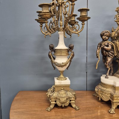 Lot 454 - An ormolu, bronze and white marble clock...