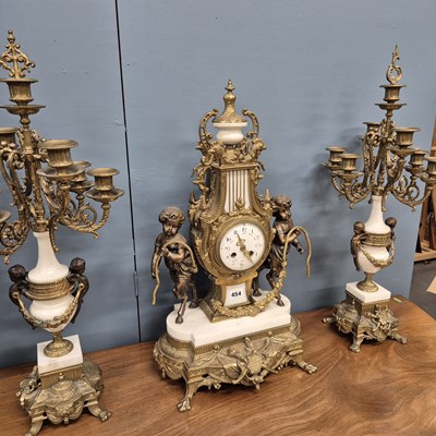 Lot 454 - An ormolu, bronze and white marble clock...