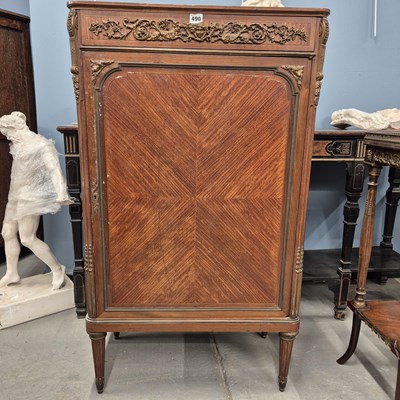 Lot 490 - A late 19th century French marble topped music...