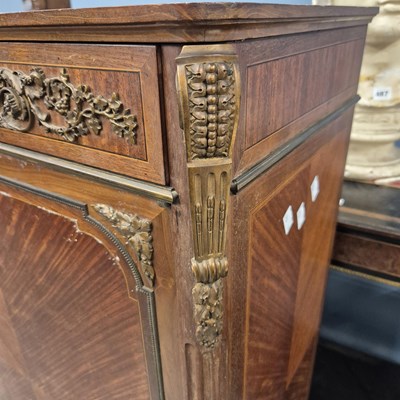 Lot 490 - A late 19th century French marble topped music...