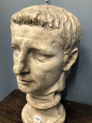 Lot 498 - A plaster bust of Augustus Caeser on a socle...