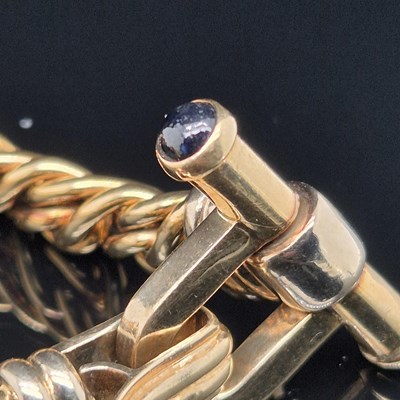 Lot 34 - An Italian woven link bracelet with gem-set...