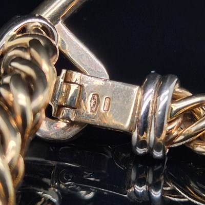 Lot 34 - An Italian woven link bracelet with gem-set...