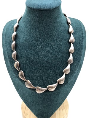 Lot 83 - Georg Jensen. A hallmarked silver Lotus-style...