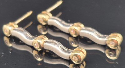 Lot 94 - A pair of gemset yellow and white gold drop...