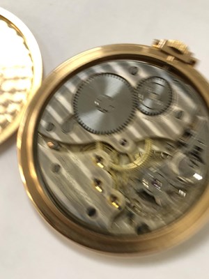 Lot 552 - A Movado 18ct gold slimline pocket watch with...
