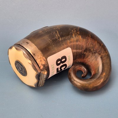 Lot 558 - A 19th century horn snuff mull, with silver...
