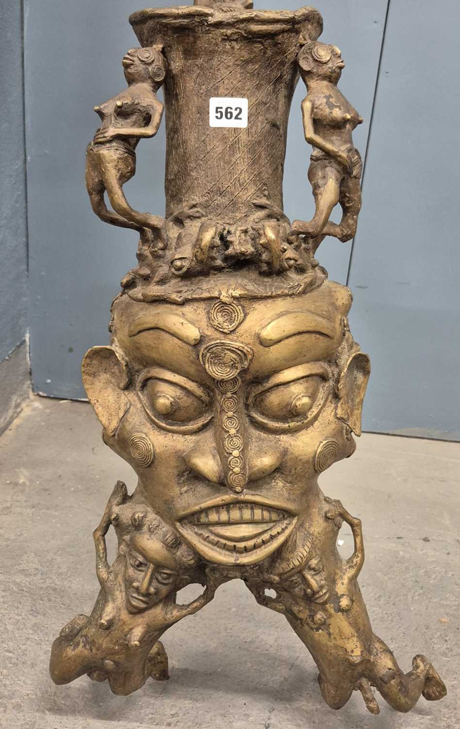 Lot 562 - A Benin bronze ceremonial pipe, the mask bowl...