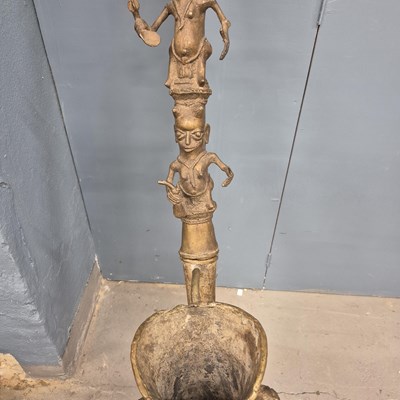 Lot 562 - A Benin bronze ceremonial pipe, the mask bowl...