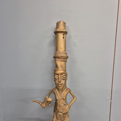 Lot 562 - A Benin bronze ceremonial pipe, the mask bowl...