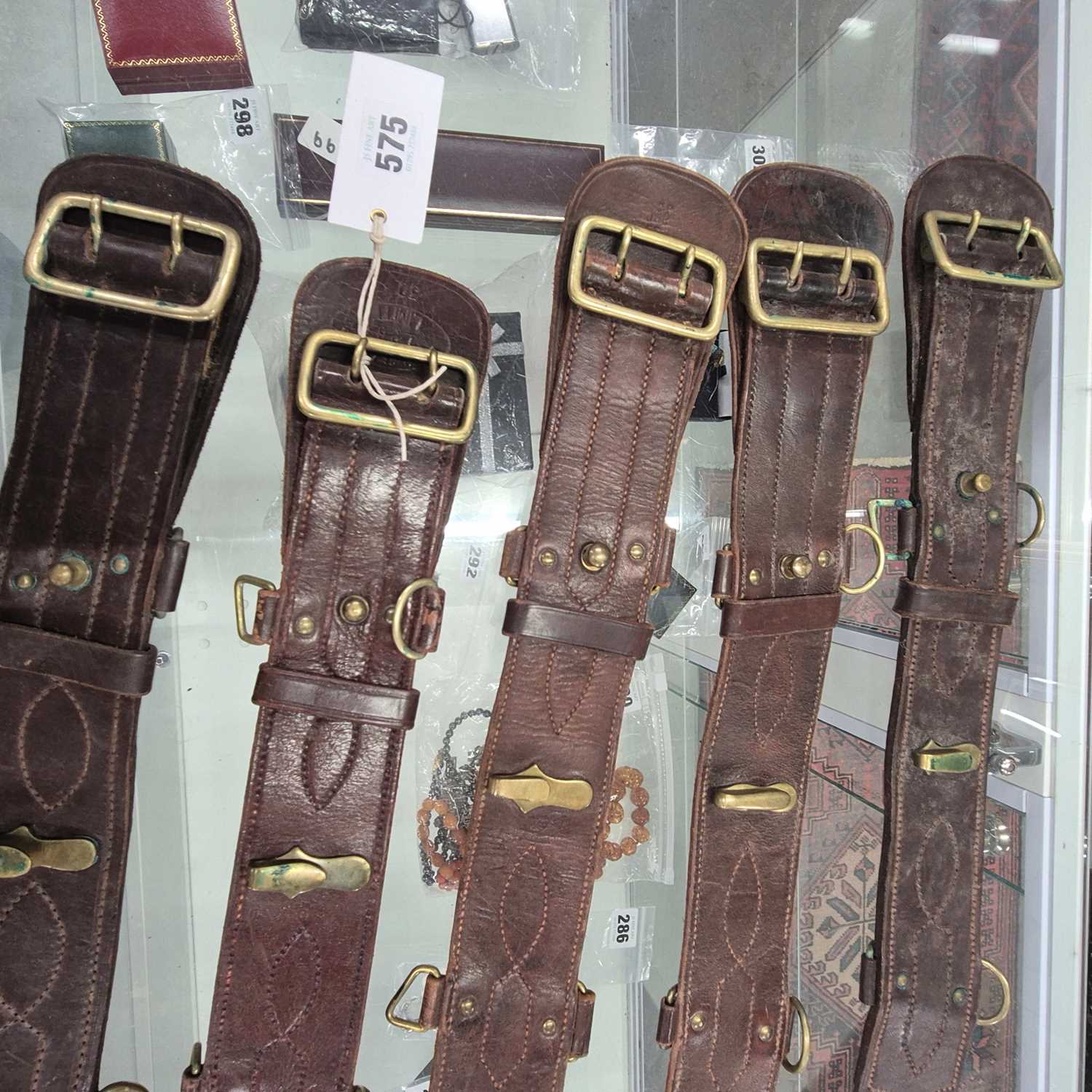 Lot 575 - Five various Sam Browne leather belts with...